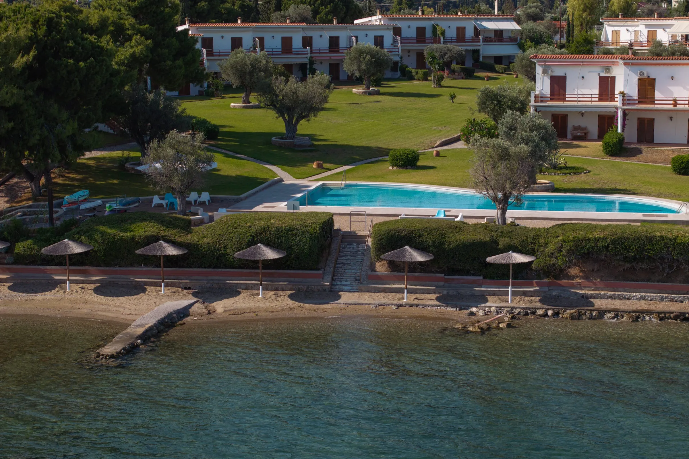 Veya Suite — saltwater pool and seafront garden, aerial view
